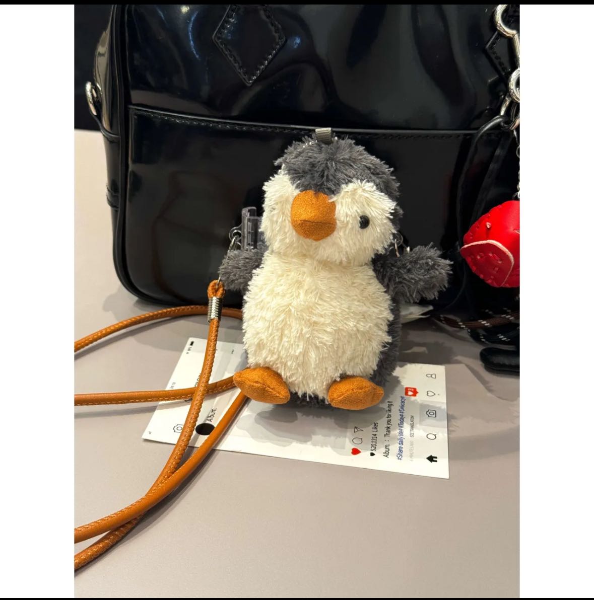ぬいぐるみペンギン付きケース